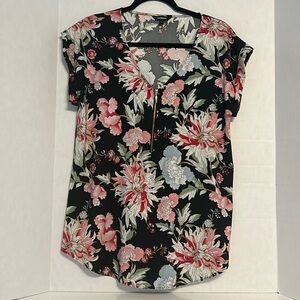 Tropical print blouse.